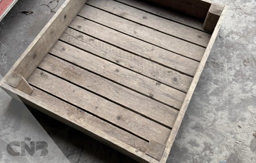 Foto van Houten broeibakken