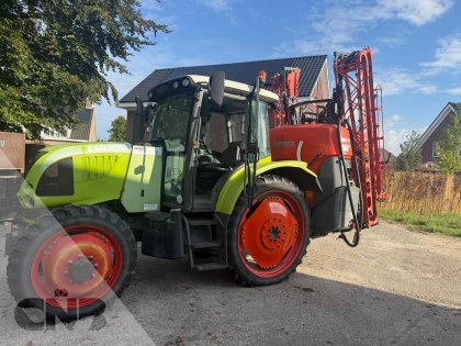 Claas- ARES 547 ATZ met Kubota spuit